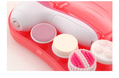 White electric facial cleanser with multiple brush and sponge attachments in an open translucent teal carrying case. - Image 16