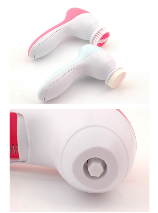 White electric facial cleanser with multiple brush and sponge attachments in an open translucent teal carrying case. - Image 17