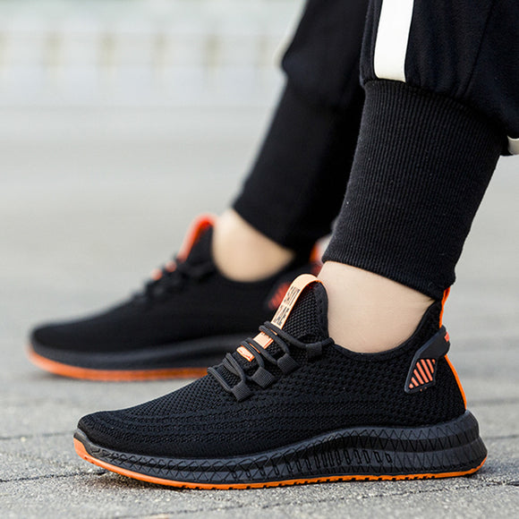 Tenis Deportivos Tejido Volador para Hombre - Cómodos y Modernos