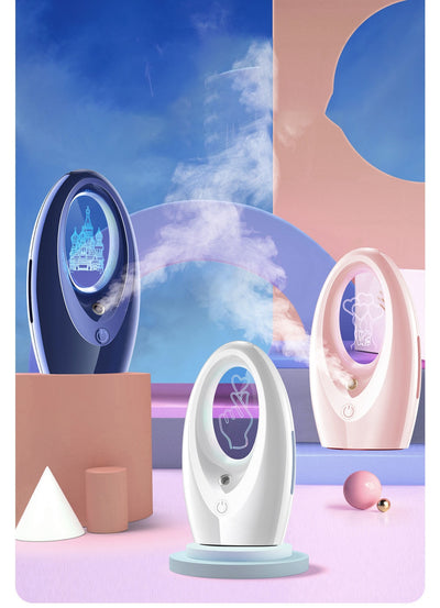 Navy blue USB humidifier with an oval shape and an illuminated castle design in the center. - Image 9