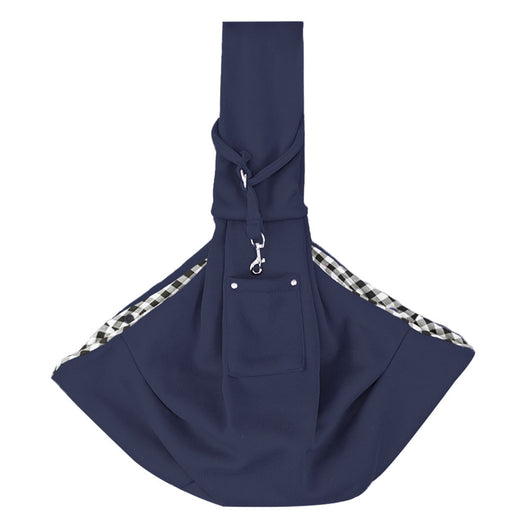 Person in white hoodie carrying a happy white dog in a navy blue pet sling bag outdoors. - Image 41