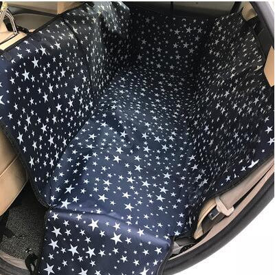 Dark blue car pet seat cover with white star pattern installed in a vehicle's back seat. - Image 2