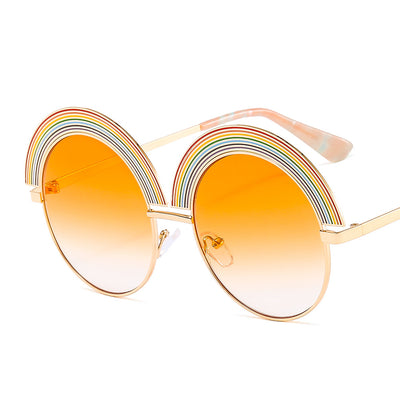 Metal rainbow large round frame sunglasses with pink gradient lenses and a gold-tone frame. - Image 4