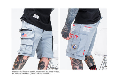 Pantalones cortos de playa con cierre y múltiples bolsillos - Image 4