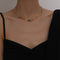 Collar Multicapa Dorado con Diamantes Verdes