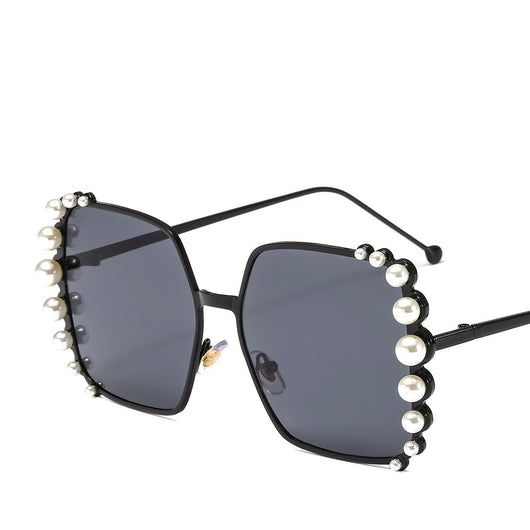 Oversized hexagonal sunglasses with gold-tone metallic frames, light pink lenses, and faux pearl embellishments. - Image 3