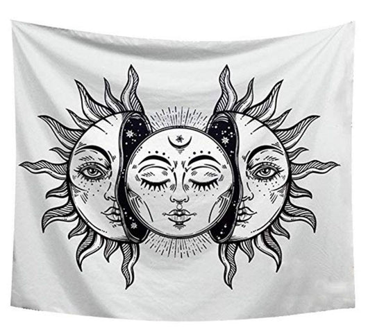White tapestry with a black and white celestial design featuring three faces representing the sun and moon.