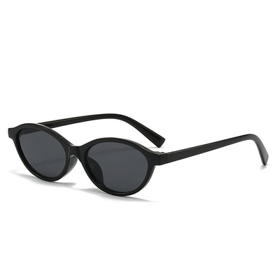 Retro fashion small frame sunglasses with translucent brown frames and yellow oval lenses, viewed from an angle. - Image 11
