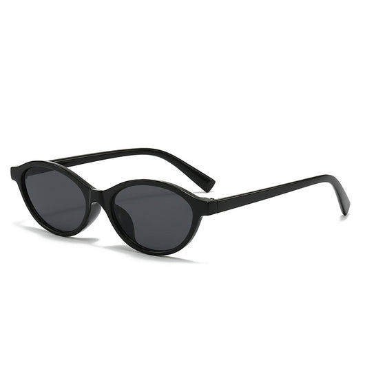 Retro fashion small frame sunglasses with translucent brown frames and yellow oval lenses, viewed from an angle. - Image 11
