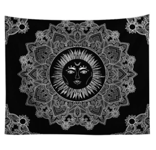 Black and white celestial sun tapestry with intricate mandala patterns hanging above a white sofa. - Image 2