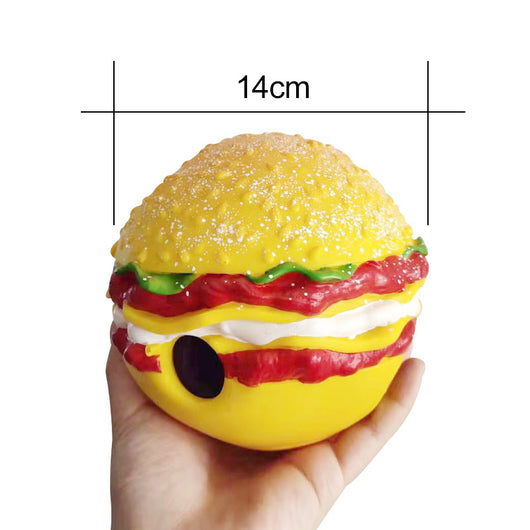 Yellow hamburger-shaped dog sound toy pet ball with red, white, and green details, featuring textured surfaces and purple sound components. - Image 2
