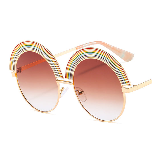 Metal rainbow large round frame sunglasses with pink gradient lenses and a gold-tone frame. - Image 2