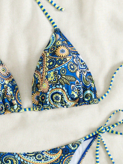 Female creative minimally printed split bikini set with a vibrant bohemian pattern and tie-side bottoms. - Image 13