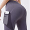 Pantalones fitness ajustados con bolsillos de malla lateral