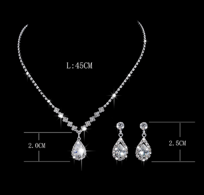 Sparkling rhinestone necklace and matching teardrop earrings set, ideal for bridal or formal occasions. - Image 2