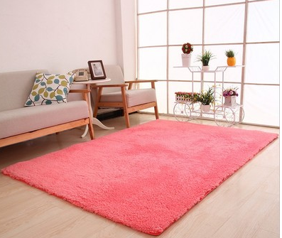 Fluffy purple rectangular area rug on a light wood floor in a modern living room with a sofa and plant stand. - Image 7