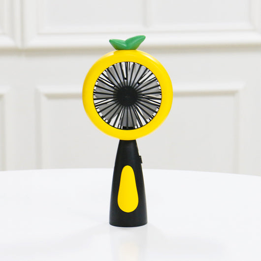 White and lime green children's handheld fan with a round head, small leaf accent, and fruit-like design. - Image 2
