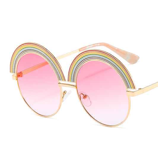 Metal rainbow large round frame sunglasses with pink gradient lenses and a gold-tone frame.