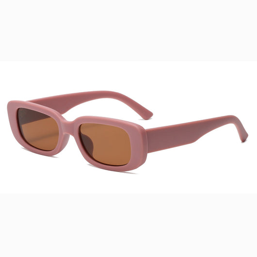 Rectangular tortoiseshell sunglasses with a small frame and dark gray lenses, angled on a white background. - Image 15