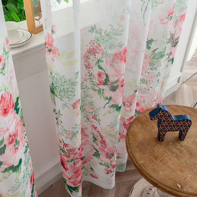 Sheer white mesh curtains with purple and light blue floral patterns, hung on a black rod in a bright room. - Image 3