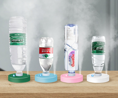 White round portable USB humidifier with a night light, single fog outlet, and two control buttons. - Image 9