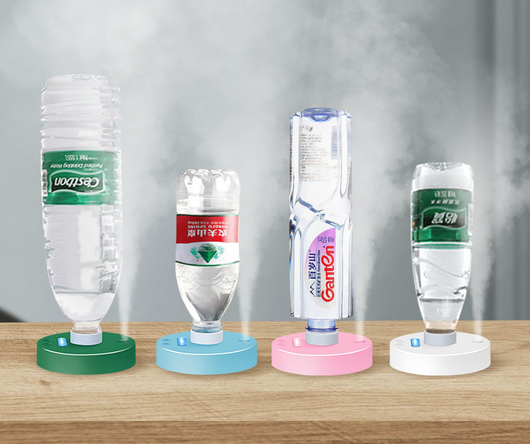 White round portable USB humidifier with a night light, single fog outlet, and two control buttons. - Image 9