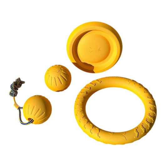 Yellow 7cm solid EVA dog toy ball with textured surface and dog silhouette graphic. - Image 3
