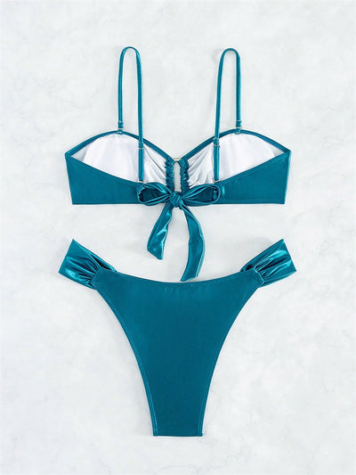 Solid black glossy two-piece bikini with a bandeau top featuring a ruched front and U-shaped detail, and high-cut ruched bottoms. - Image 16