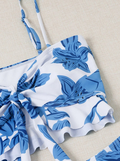 Women's pink floral print two-piece swimsuit with a tie-front crop top, high-waisted triangle bottoms, and matching sheer sarong. - Image 5