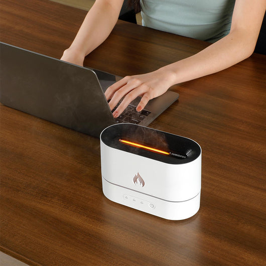 Black flame aromatherapy machine with a rose gold flame icon and timer settings for 1, 3, and 5 hours. - Image 3