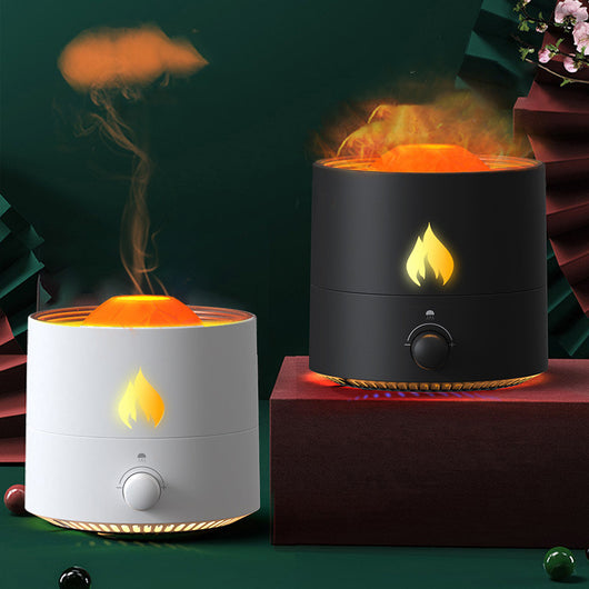 White cylindrical night light and ultrasonic humidifier with an orange flame effect light and a control knob.