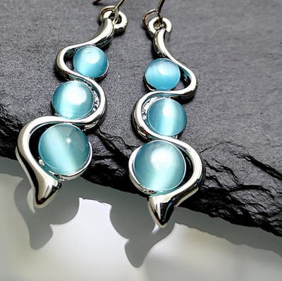 Aretes Ondulados Estilo Bohemio con Gema Ojo de Gato - Image 6
