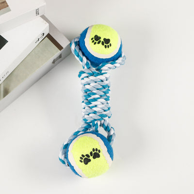 Red, pink, and white braided cotton rope dog toy with a green and red tennis ball featuring black paw prints. - Image 13