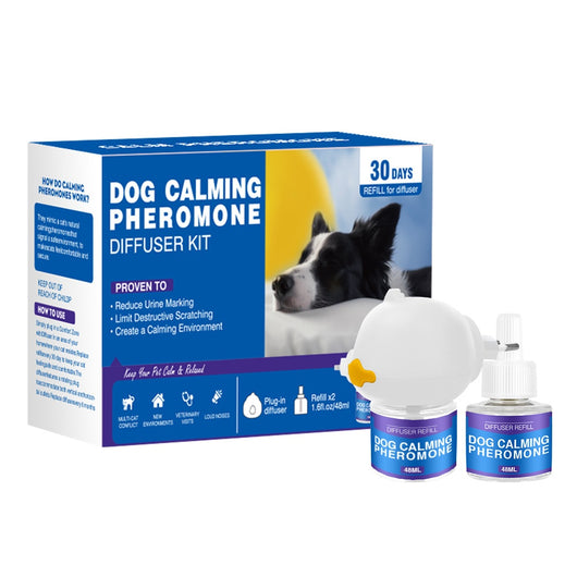 Cat Calming Pheromone Diffuser Kit with a white plug-in diffuser and a green refill bottle, next to its green and white box. - Image 24