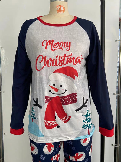 Matching family Christmas pajamas with dark blue long-sleeve tops, light gray fronts, and a snowman graphic. - Image 12