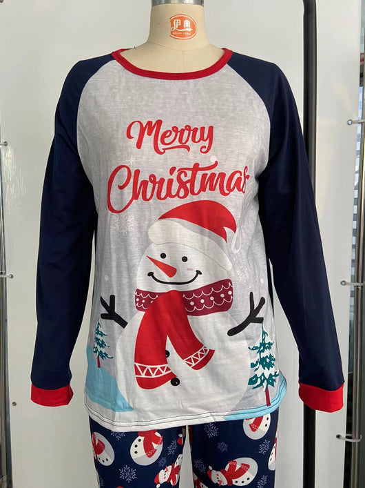 Matching family Christmas pajamas with dark blue long-sleeve tops, light gray fronts, and a snowman graphic. - Image 12