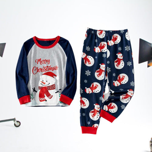Matching family Christmas pajamas with dark blue long-sleeve tops, light gray fronts, and a snowman graphic. - Image 13
