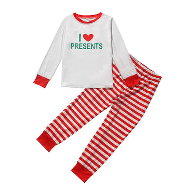 White long-sleeve pajama top with "I ❤️ CHOCOLATE" graphic and red trim, paired with red and white striped pajama pants. - Image 20