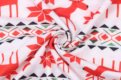 Mother and two daughters in matching red and white reindeer and snowflake print long-sleeve Christmas pajamas. - Image 22