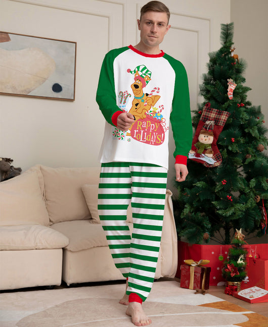 Woman wearing green and white striped holiday pajamas with a Scooby-Doo "Happy Holidays!" graphic on the top. - Image 10