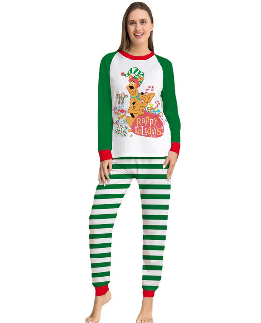 Woman wearing green and white striped holiday pajamas with a Scooby-Doo "Happy Holidays!" graphic on the top. - Image 12