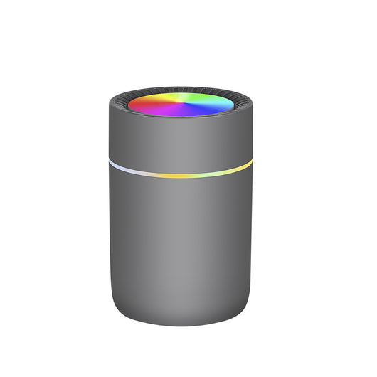 Dark gray cylindrical humidifier with a rainbow LED light ring on top and a thin, colorful LED band around its body. - Image 6