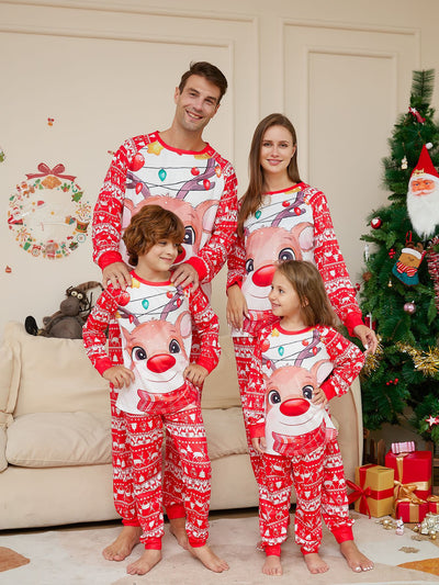 Man wearing a red and white Christmas pajama set with a reindeer graphic and fair isle pattern. - Image 14
