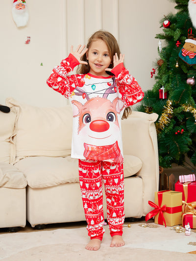 Man wearing a red and white Christmas pajama set with a reindeer graphic and fair isle pattern. - Image 19