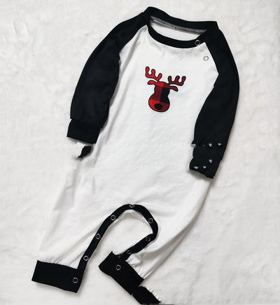 Matching family Christmas pajamas with white long-sleeve tops featuring a red plaid reindeer and red and black buffalo plaid pants. - Image 10