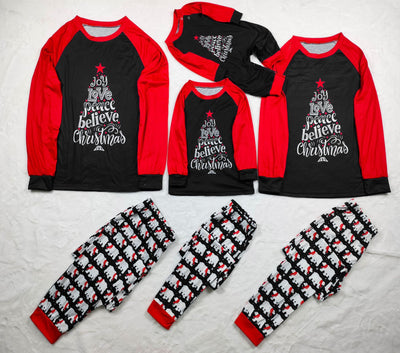 Family matching Christmas pajamas with black tops, red raglan sleeves, 'Joy Love Peace Believe Christmas' graphic, and polar bear print pants. - Image 9