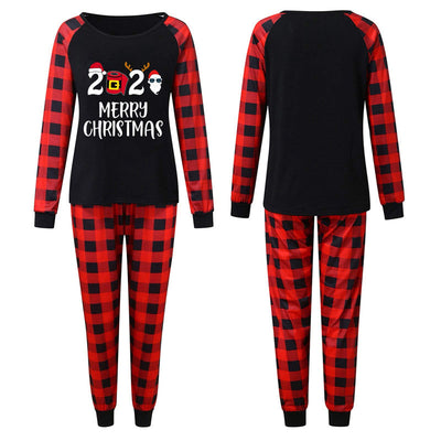 Three matching family Christmas pajama sets with black tops, red plaid sleeves, and red plaid pants. Tops feature '2020 MERRY CHRISTMAS' text. - Image 9