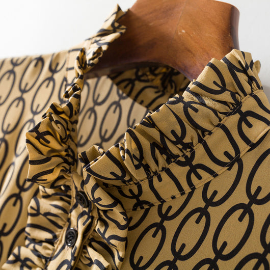 Vestido de seda con estampado de cadenas y detalles de madera - Image 8