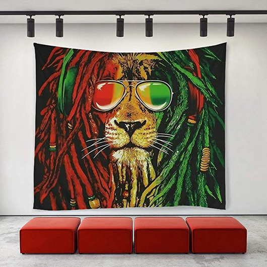 Lion tapestry art featuring a lion's head with red and green dreadlocks, wearing aviator sunglasses.