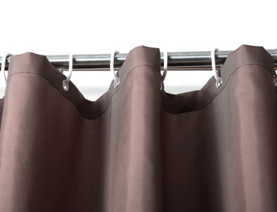 Solid brown polyester shower curtain with metal grommets and hooks, hanging from a silver shower rod. - Image 8